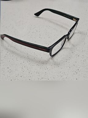 Gucci Black Frames with Red/Green Temple Stripe and Gold GUCCI Lettering.